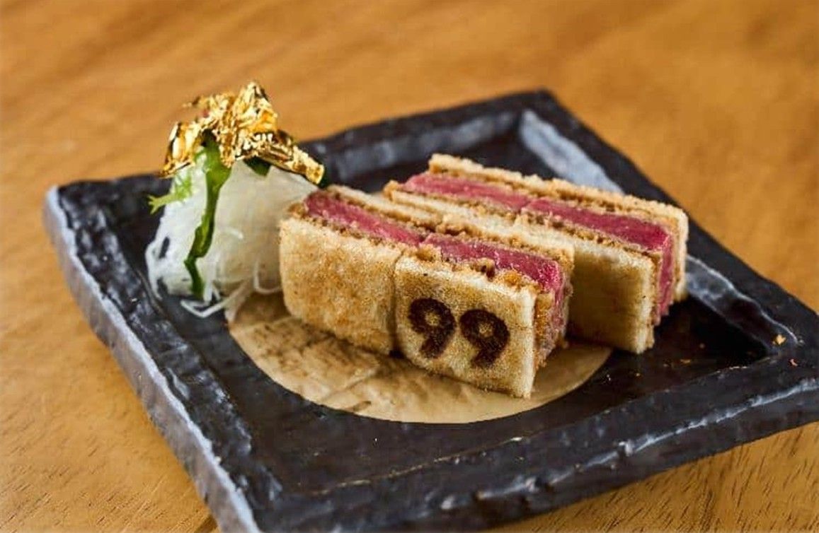 99 Sushi Bar Dubai toro tartare with Iberian smoke and crispy nori &mdash; signature dish