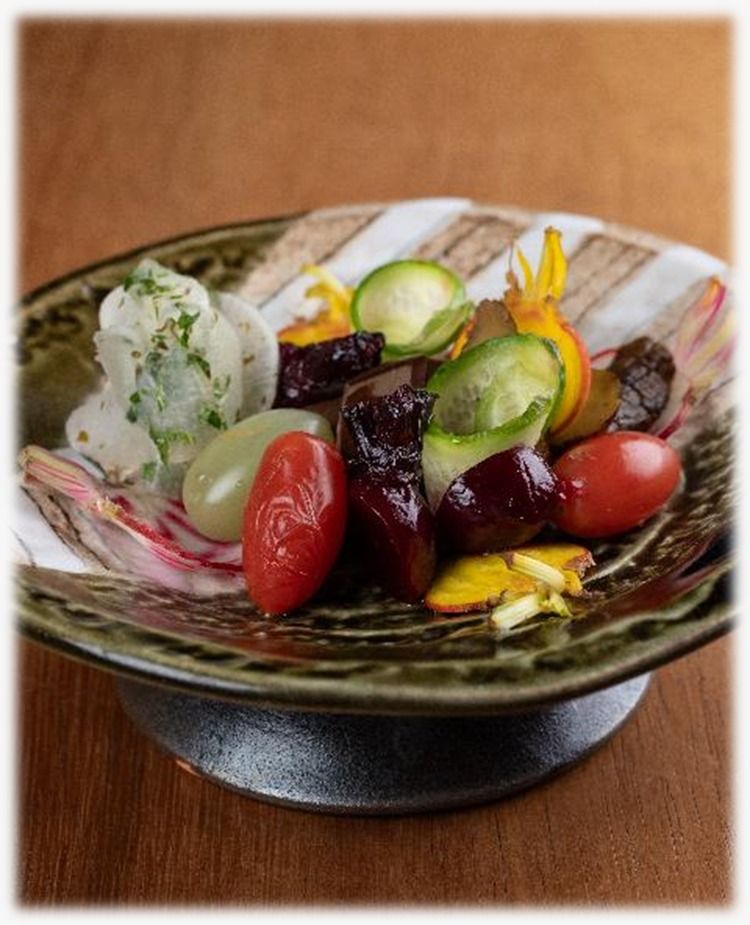 99 Sushi Bar Dubai &mdash; final plating of premium sashimi at the counter, signature Spanish-Japanese style