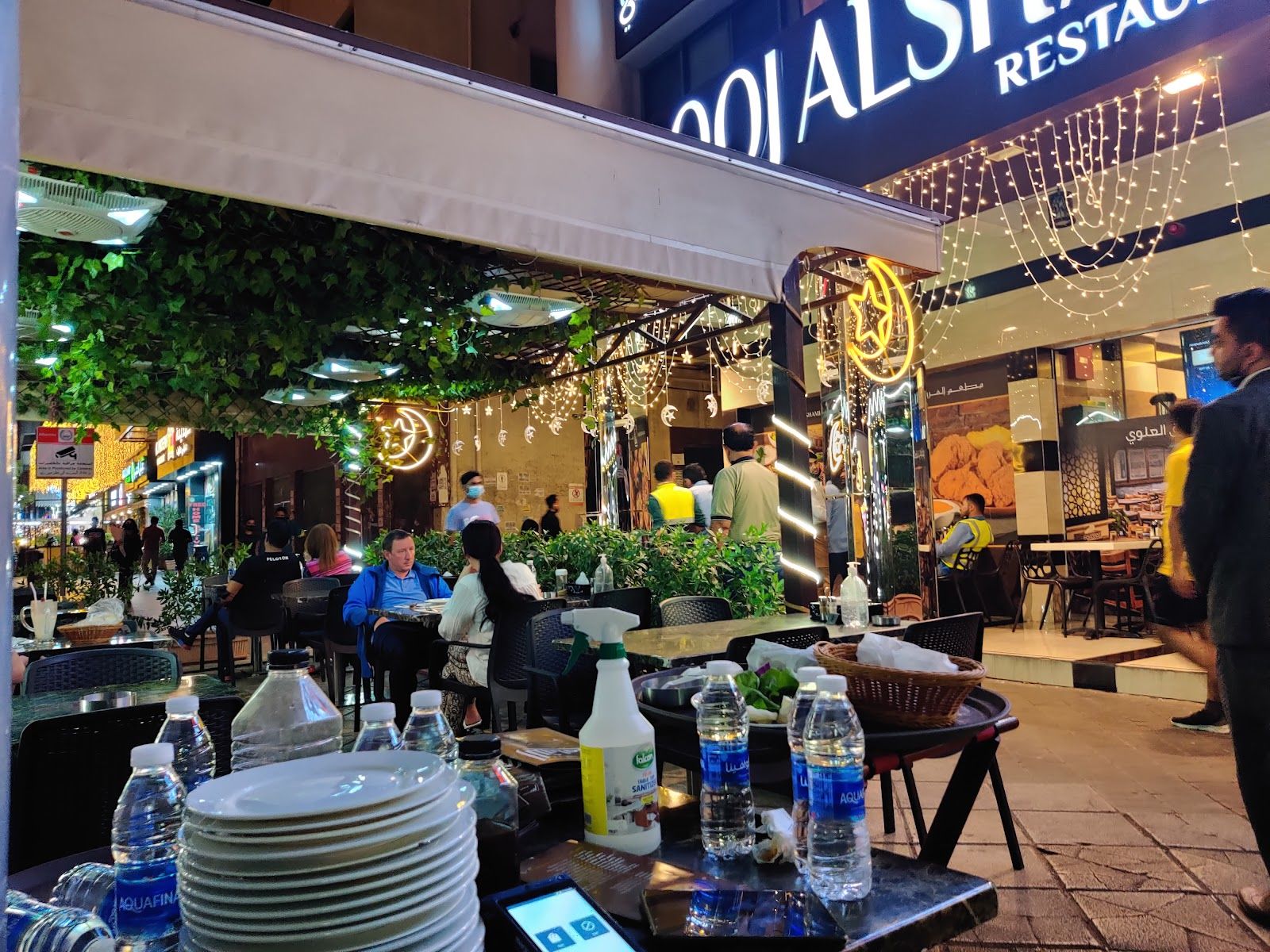 Al Rigga shawarma strip Dubai — late night standing-only stalls near DXB