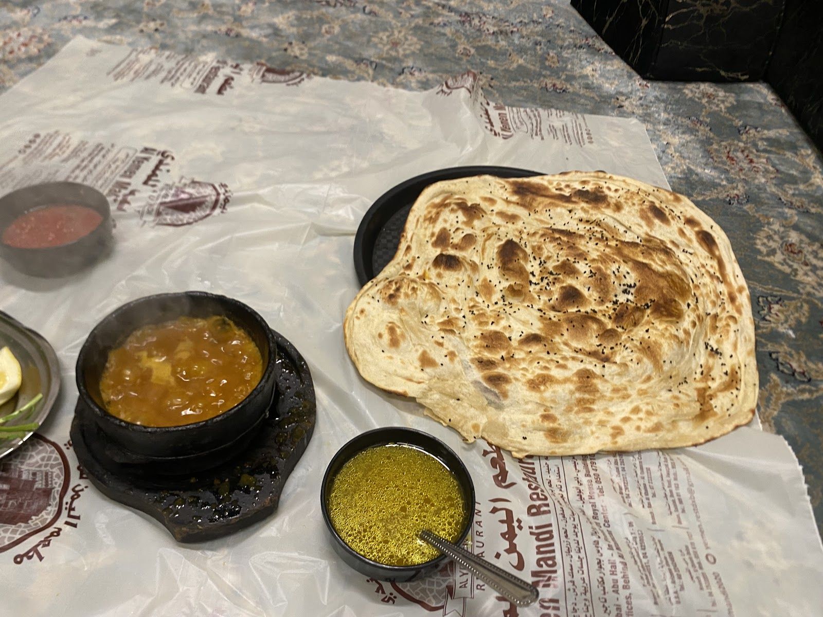 Yemeni mandi Dubai — smoked basmati rice with lamb off the bone
