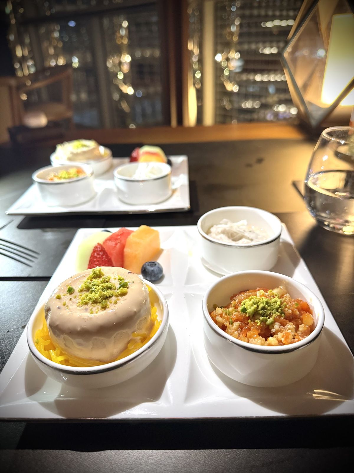 Armani/Amal Dubai — the elegant Armani dining room with fountain-facing terrace