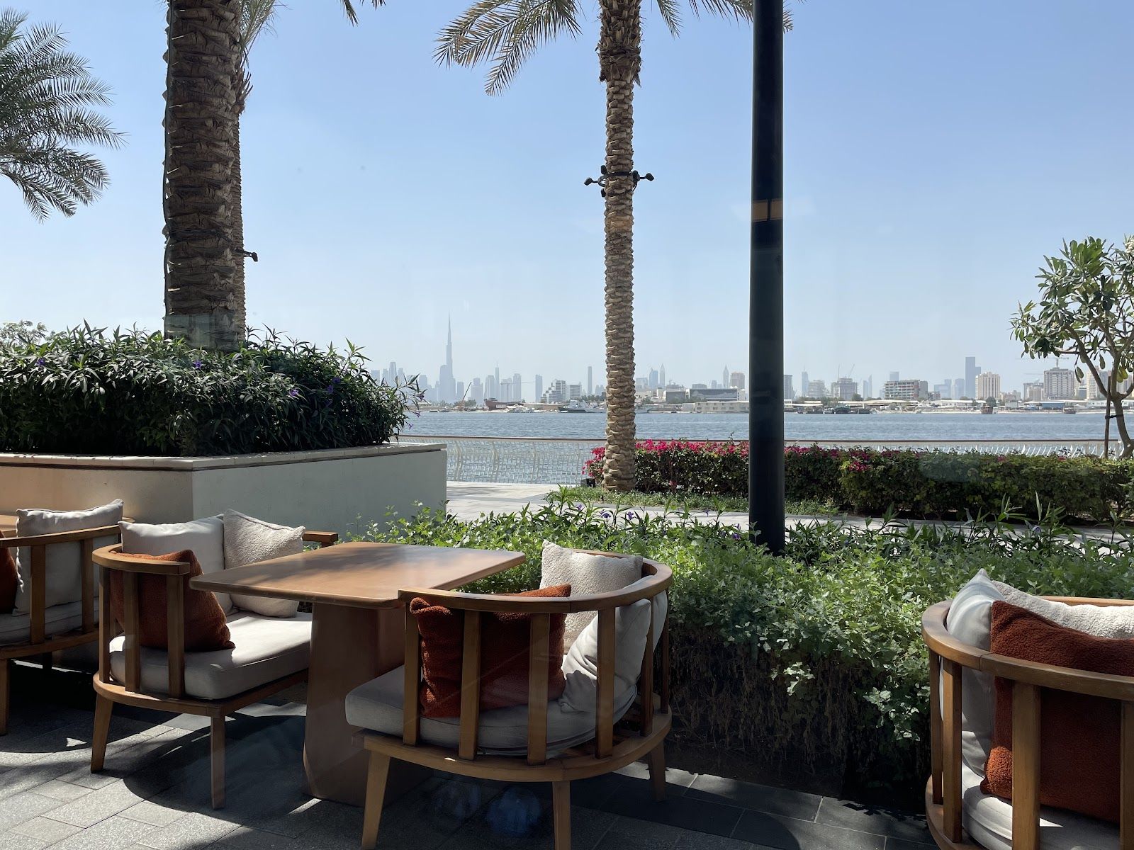 Dubai Creek Harbour waterfront promenade dining evening lights