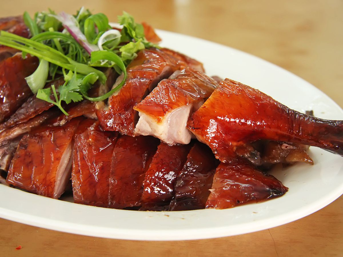Beijing Hot Pot Karama Dubai — bubbling twin-broth hot pot with lamb platter