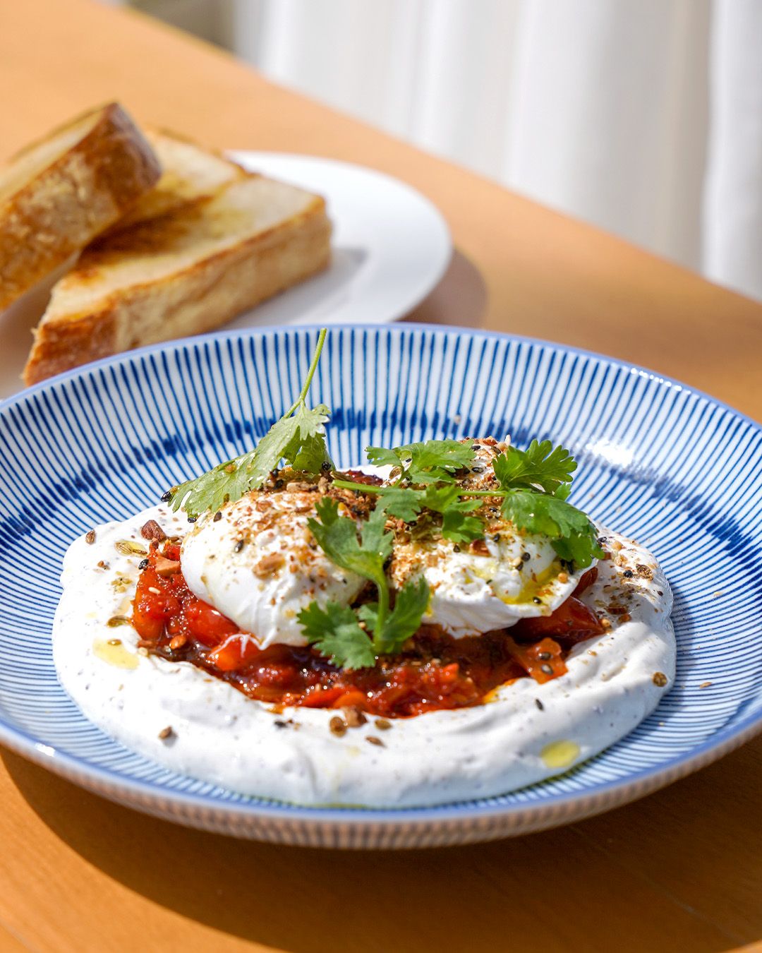 Byron Bathers Club Dubai — dishes and drinks served at the beachfront bistro