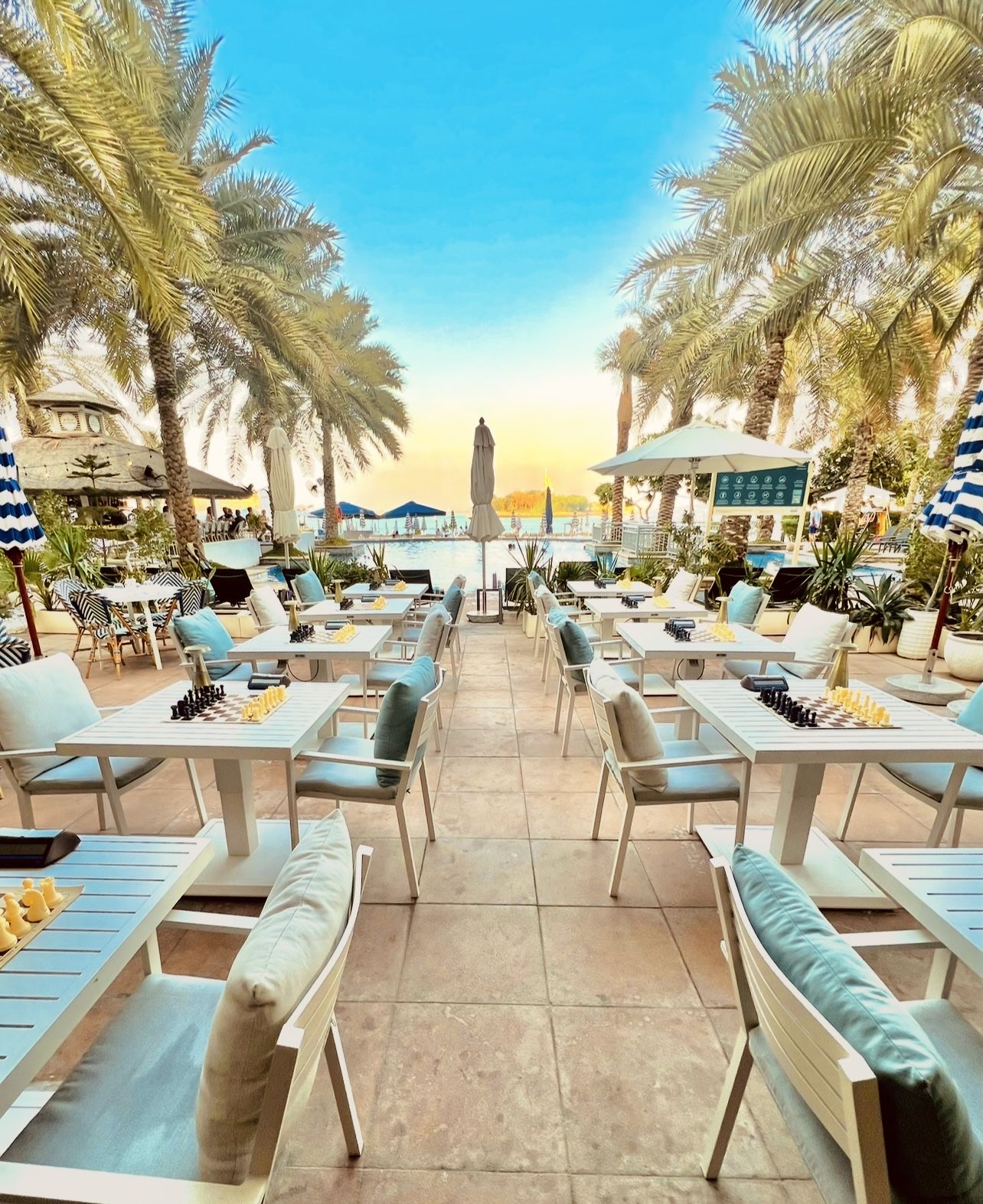 Byron Bathers Club Dubai — pool and sunbed area by the beach