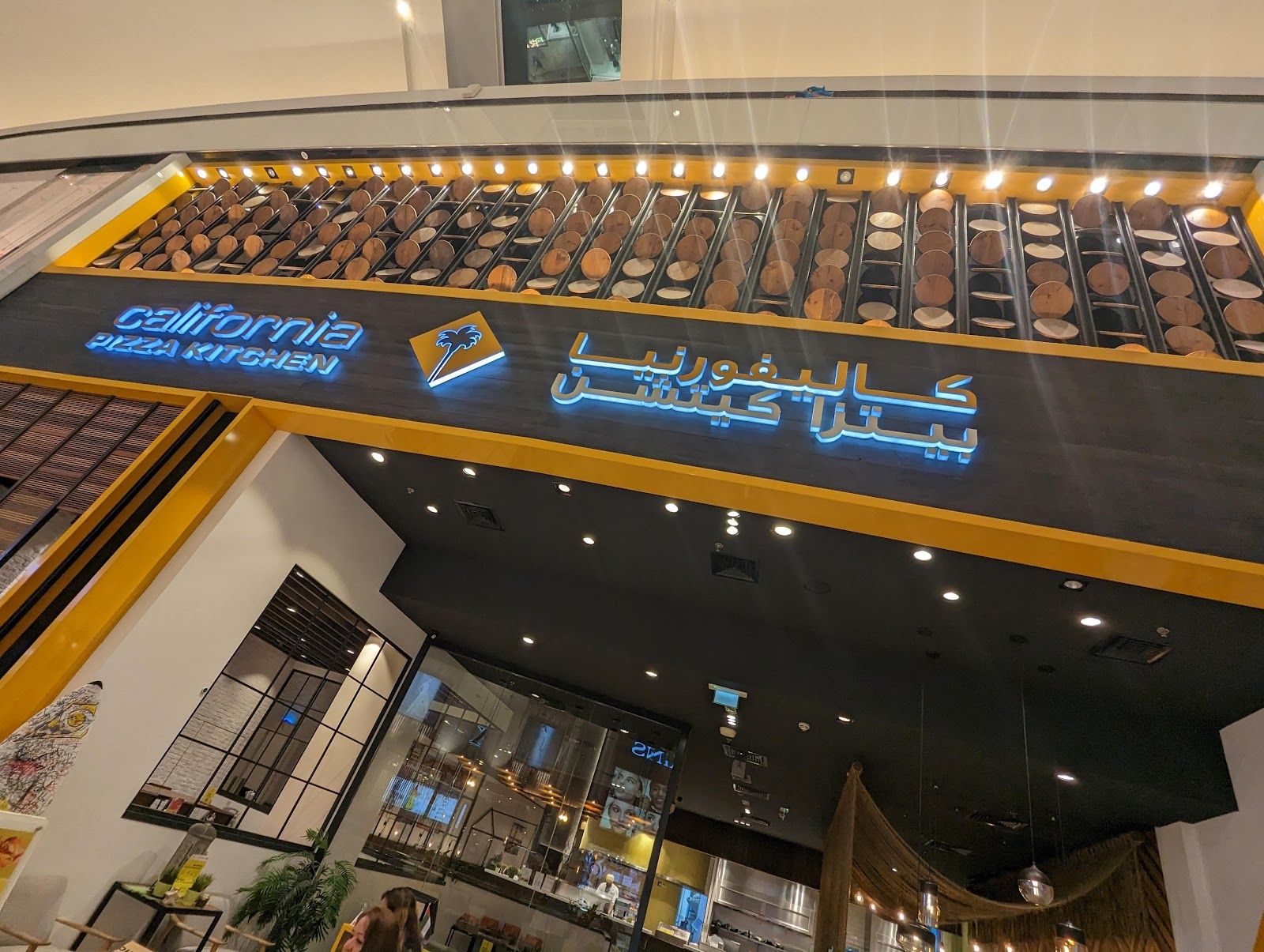 California Pizza Kitchen Dubai — the family booth and pizza spread