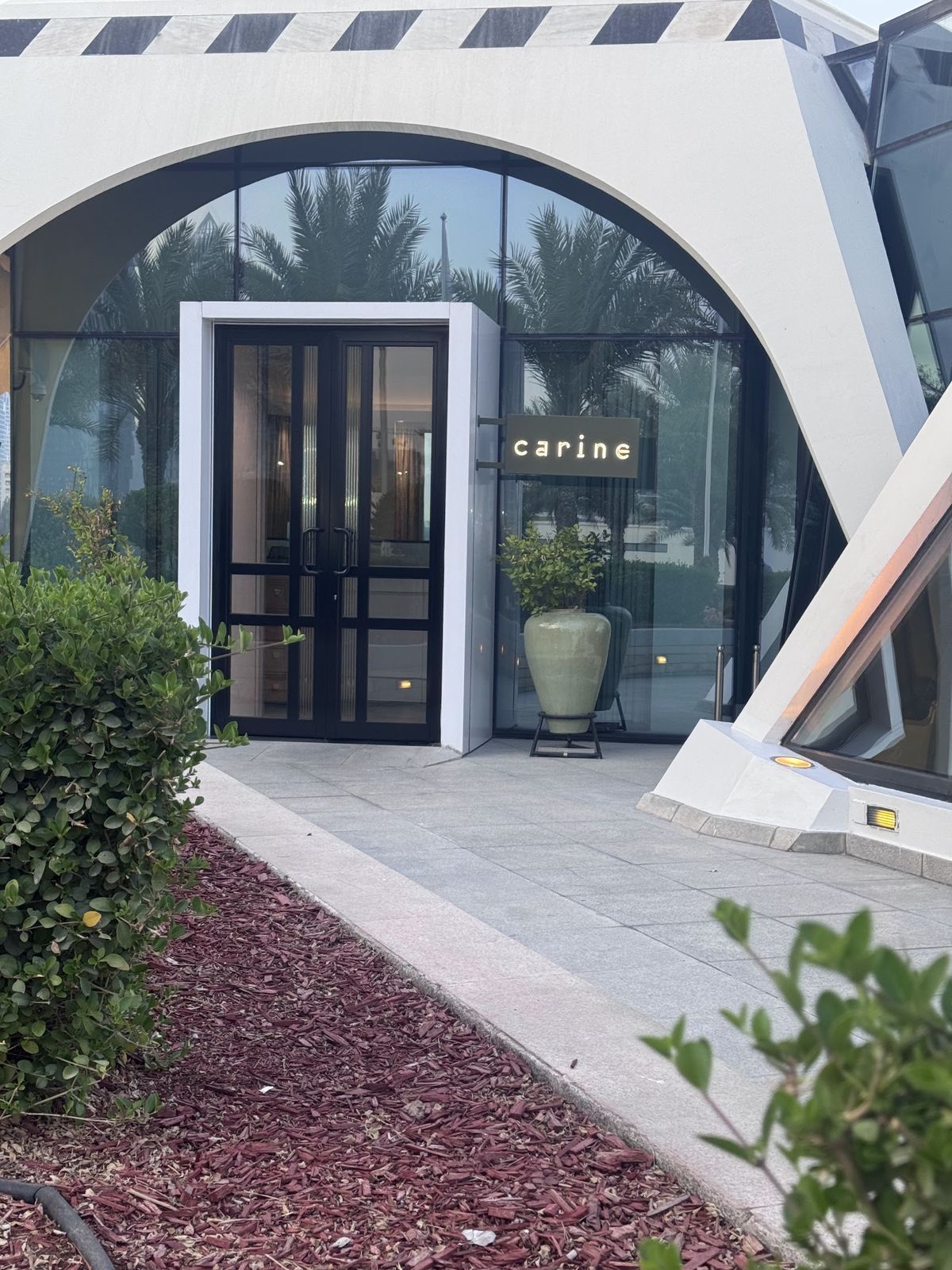 Carine Dubai — the garden terrace over the greens