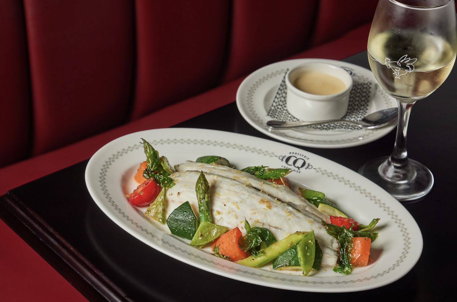 Couqley French Brasserie JLT Dubai — lakeside terrace dining with steak-frites