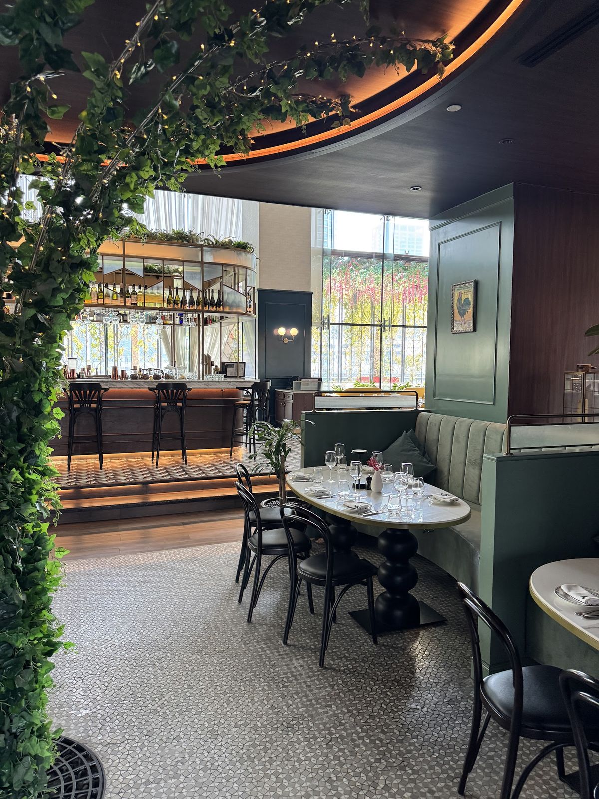 Couqley French Bistro Dubai — bistro interior with chalkboard menus