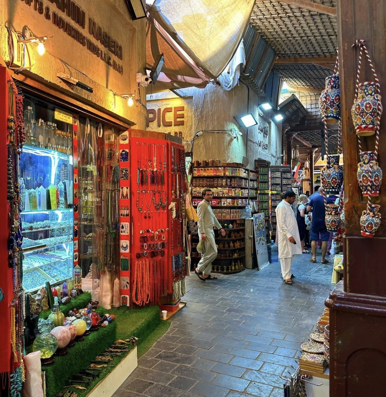 Fresh juice and street food display at a traditional Dubai market cafeteria