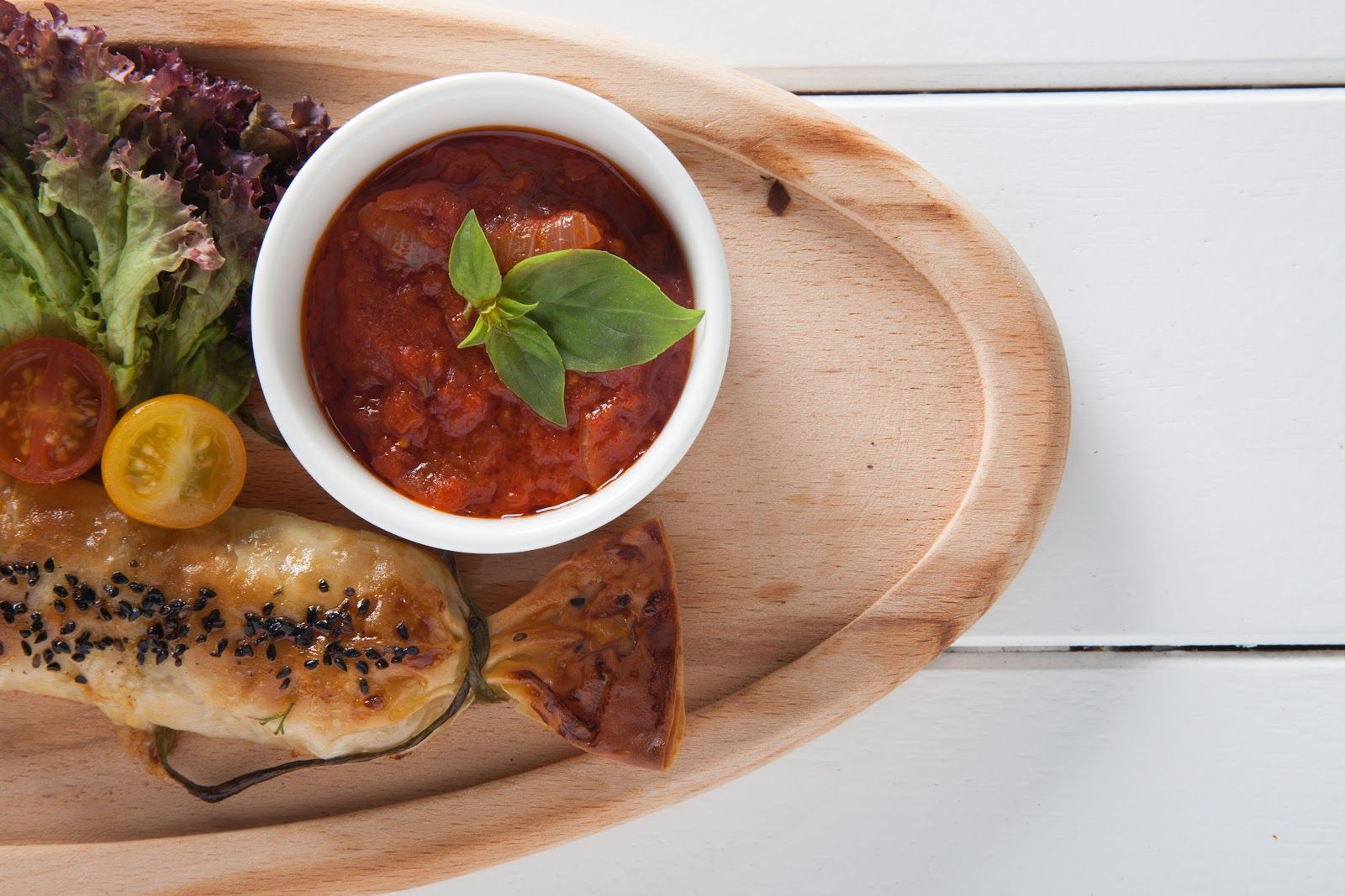 Fish Beach Taverna Dubai — whole grilled sea bass and Greek mezze