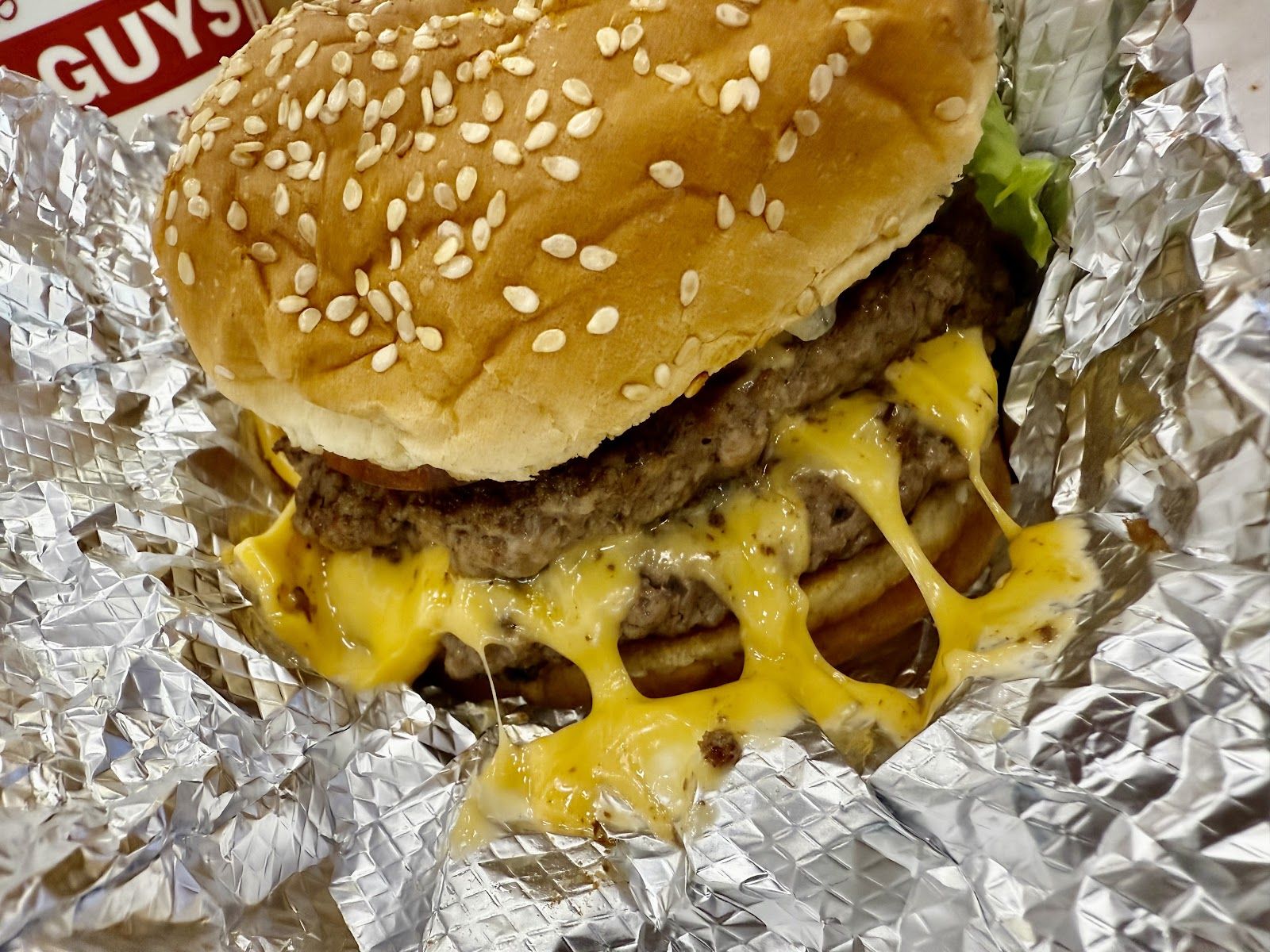 Five Guys Downtown Dubai — cheeseburger and fries