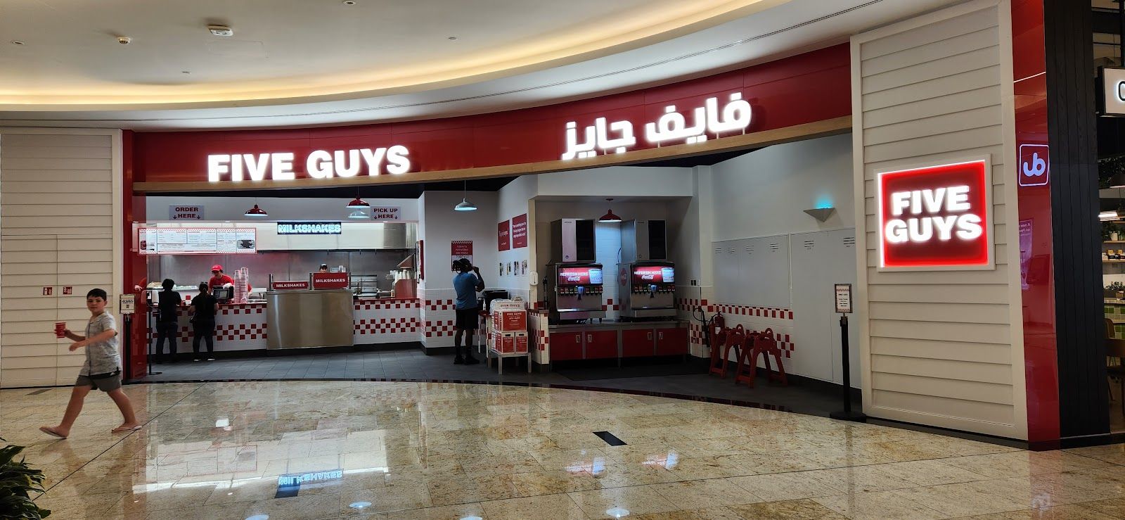 Five Guys (Nakheel Mall) Dubai — hand-formed burger and a cup of fries