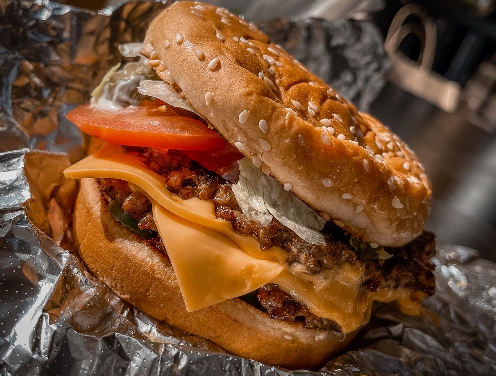Five Guys Dubai — cheeseburger and cajun fries in signature packaging