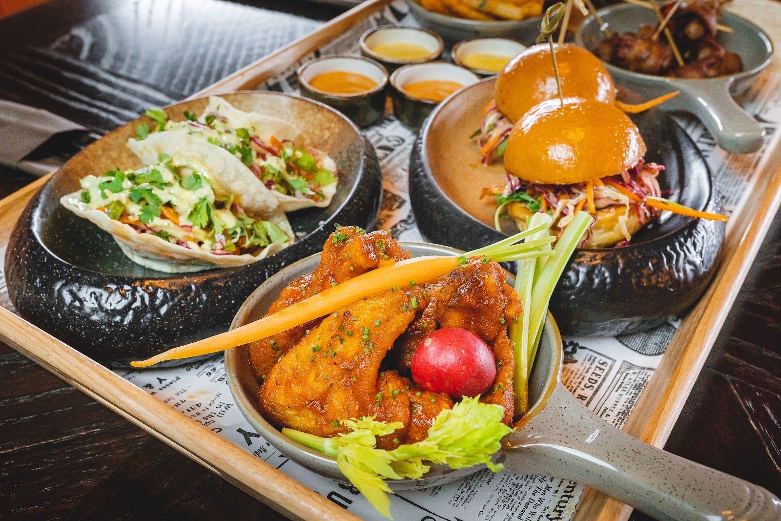 Goose Island Tap House Dubai — craft beer taps and bar interior in JVC