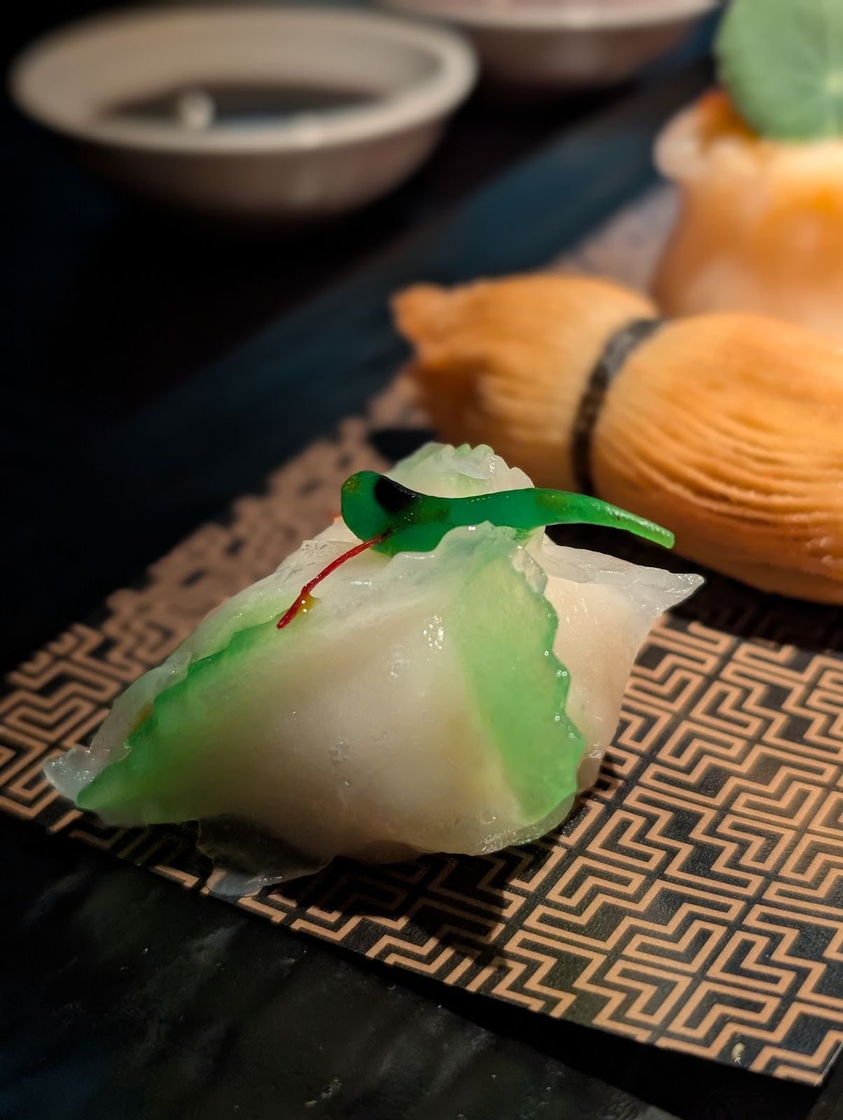 Hakkasan Dubai — signature dish and dining room