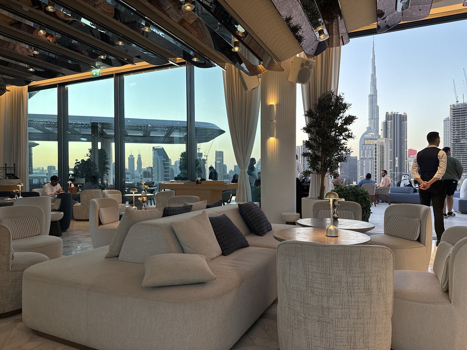 Modern rooftop lounge in Business Bay Dubai with pool, cabanas and skyline panorama