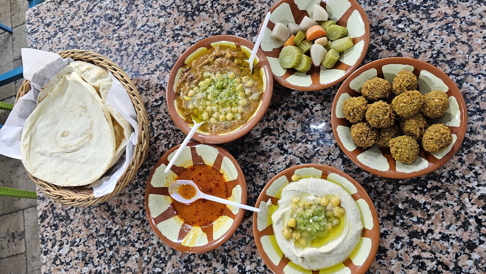 Israeli food spread mezze hummus falafel