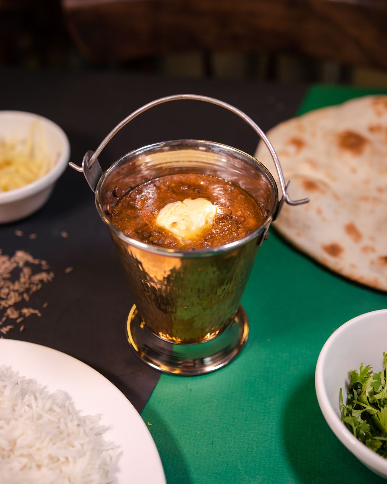 Karachi Darbar Bur Dubai — chicken karahi in the pan with fresh naan
