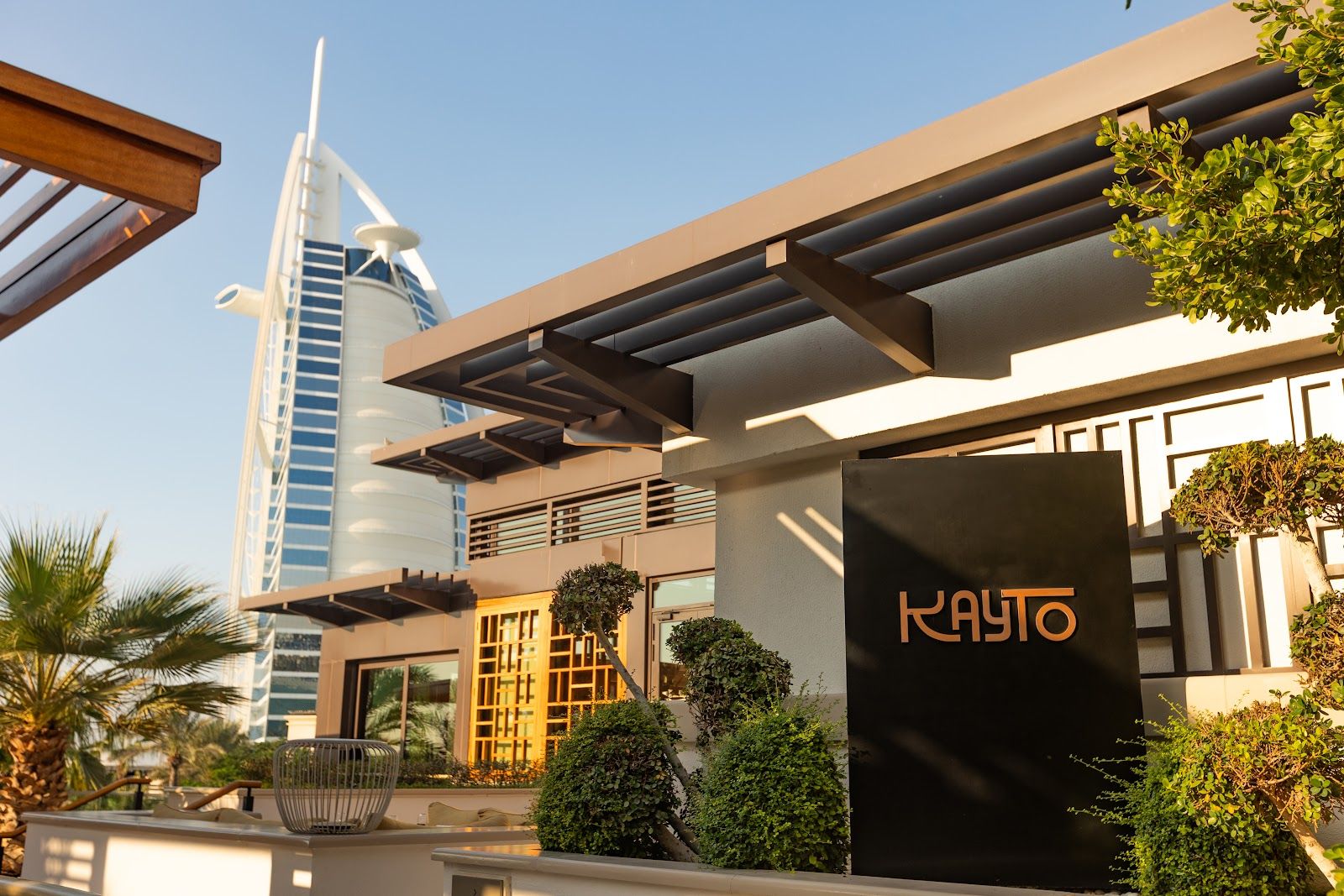 Kayto Dubai salmon truffle tiradito — Nikkei sashimi with leche de tigre and shaved black truffle
