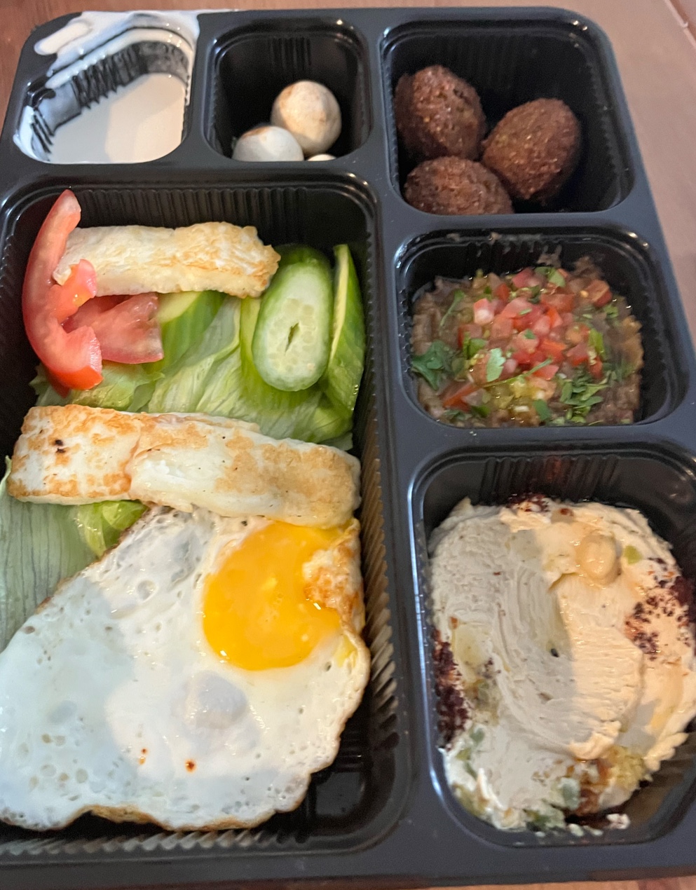 Khbz & Zaad Sustainable City Dubai — budget manakish breakfast
