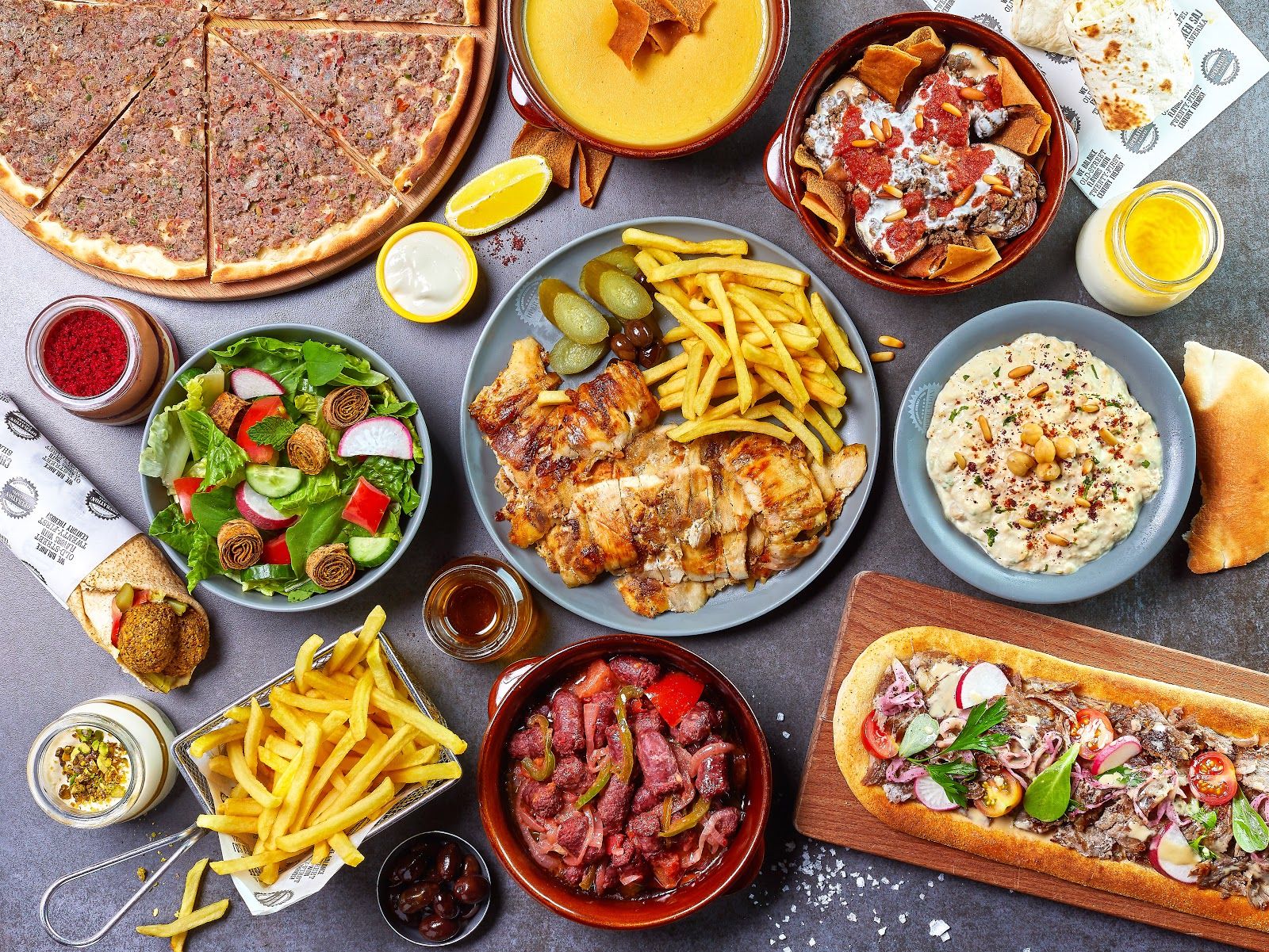 Operation Falafel Satwa Dubai — counter with shawarma and falafel wraps