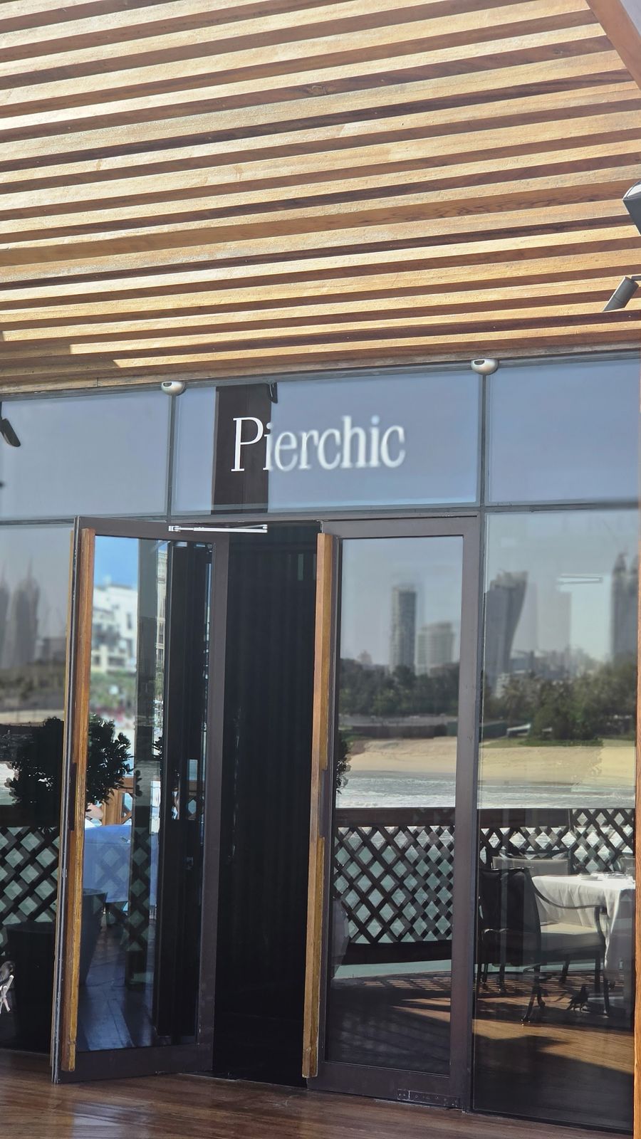 Pierchic Dubai — the overwater pavilion looking toward Burj Al Arab
