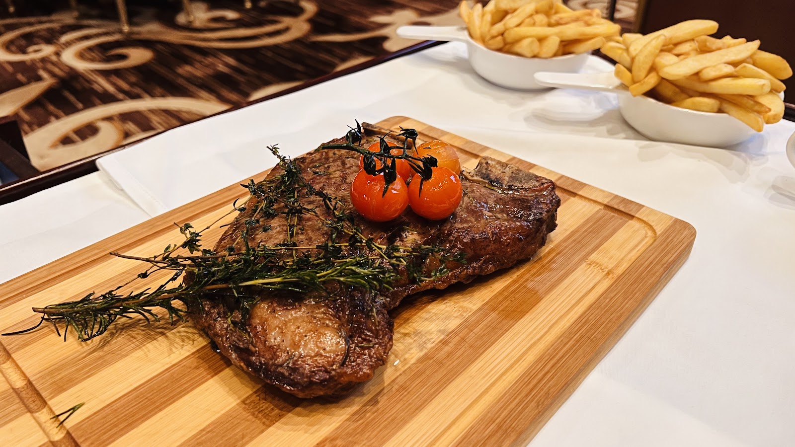 Prime Steakhouse Meydan Dubai — steak dinner overlooking the racecourse