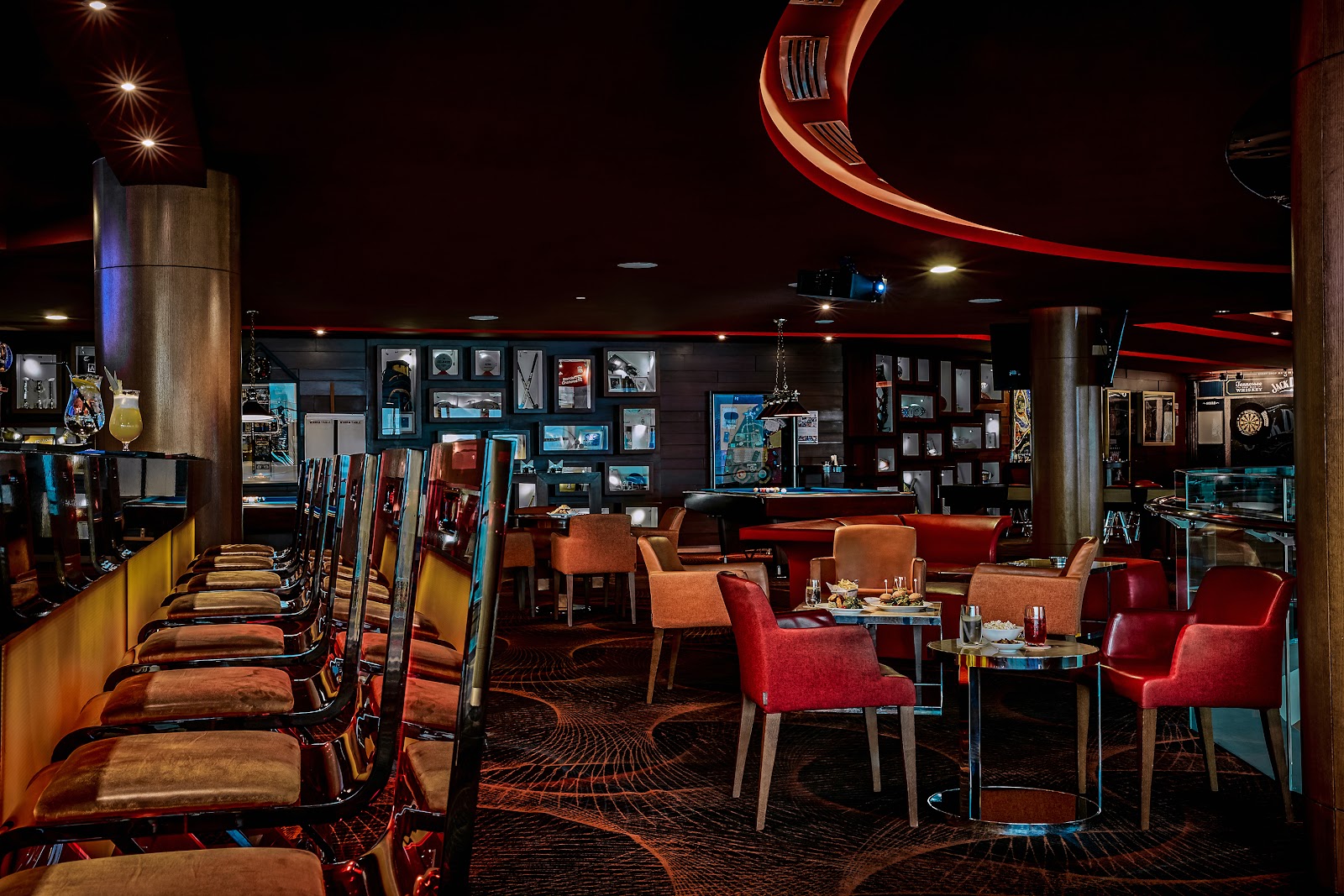 Qube Sports Bar Dubai — sports lounge with screens at The Meydan Hotel