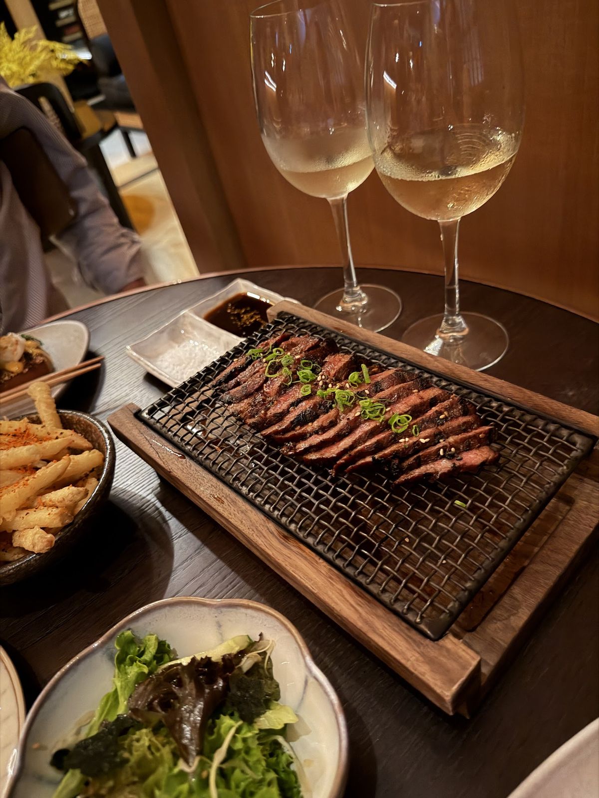 Reif Japanese Kushiyaki Dubai — kushiyaki skewers over the grill