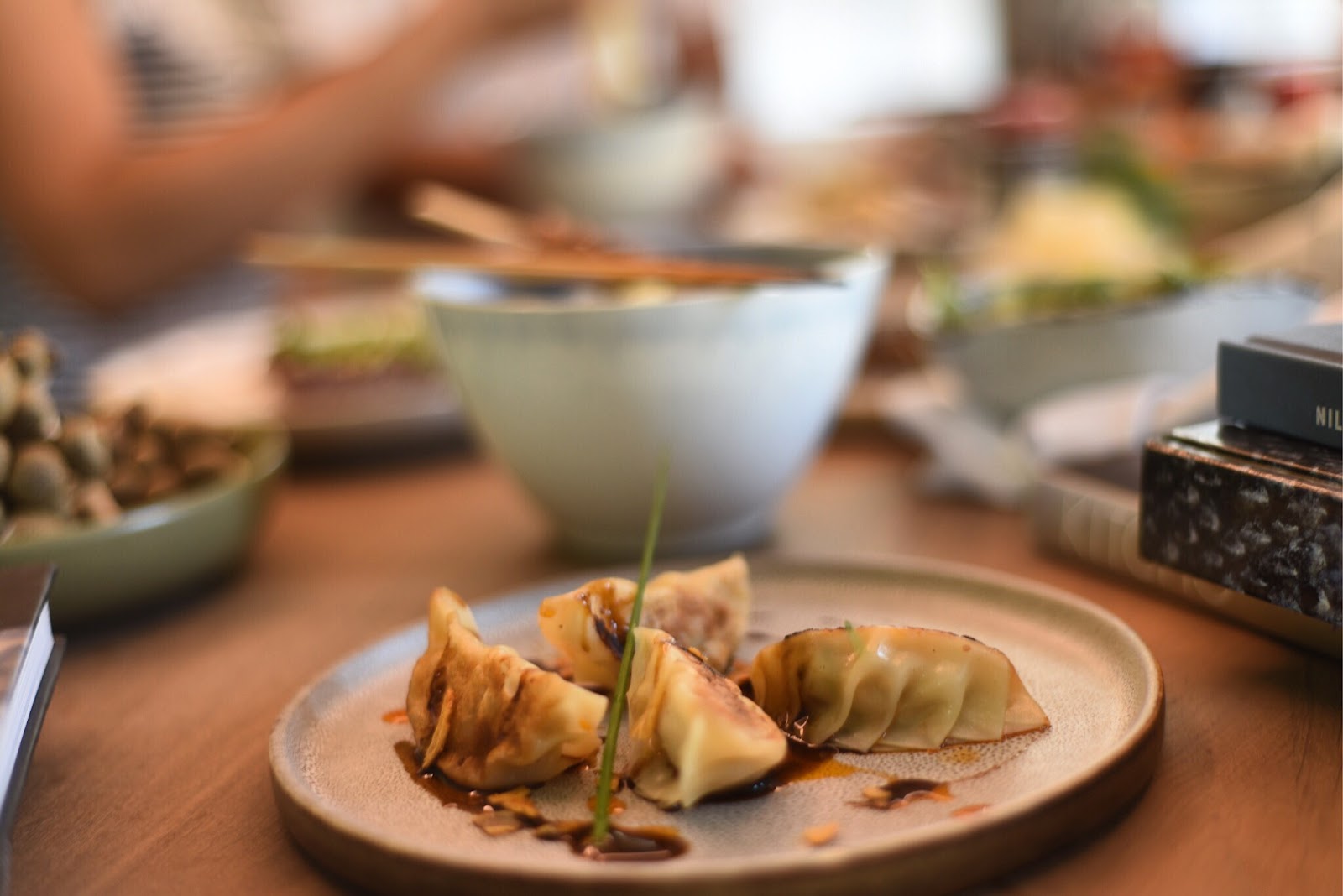 REIF Kushiyaki Dubai — counter omakase fish skewers over binchotan charcoal
