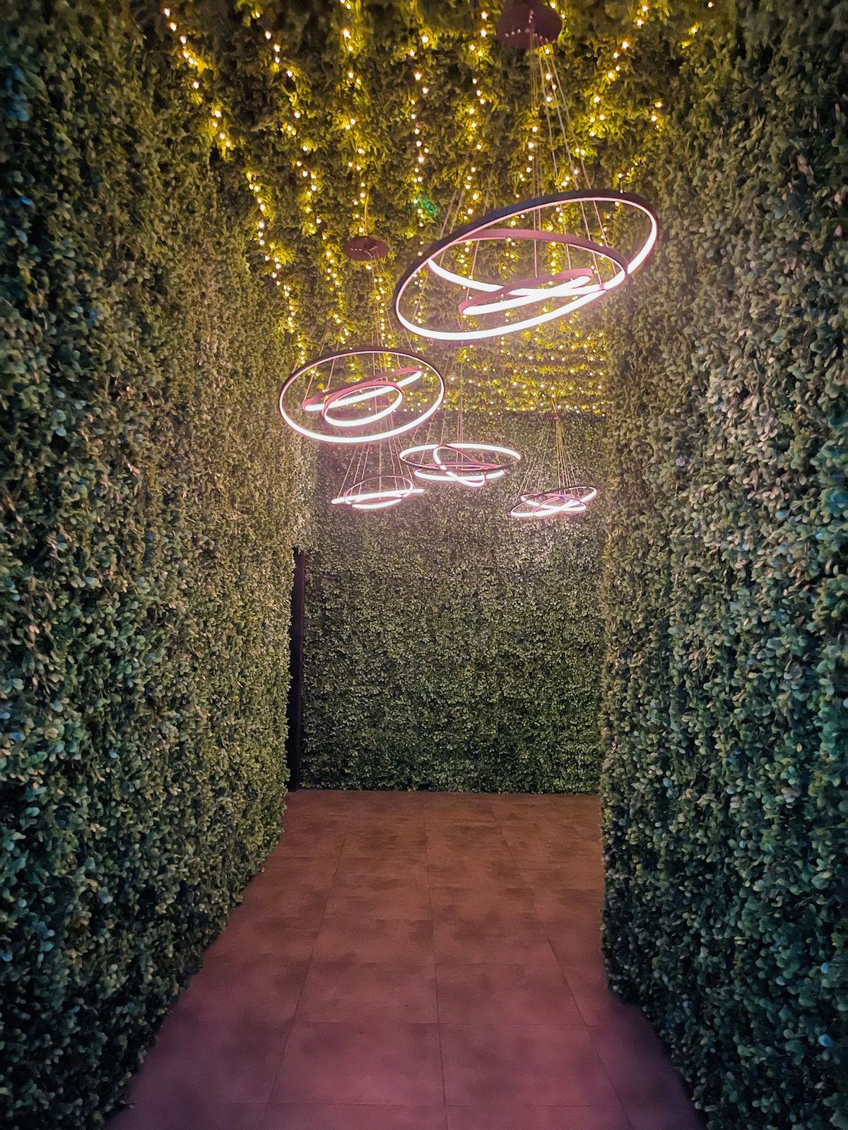 Soho Garden Rooftop Dubai — the open-air rooftop crowd at night