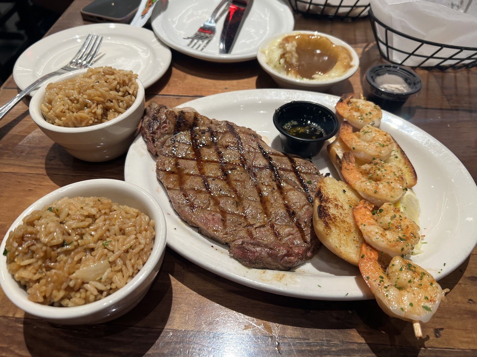 Texas Roadhouse Dubai — warm rolls and the grill