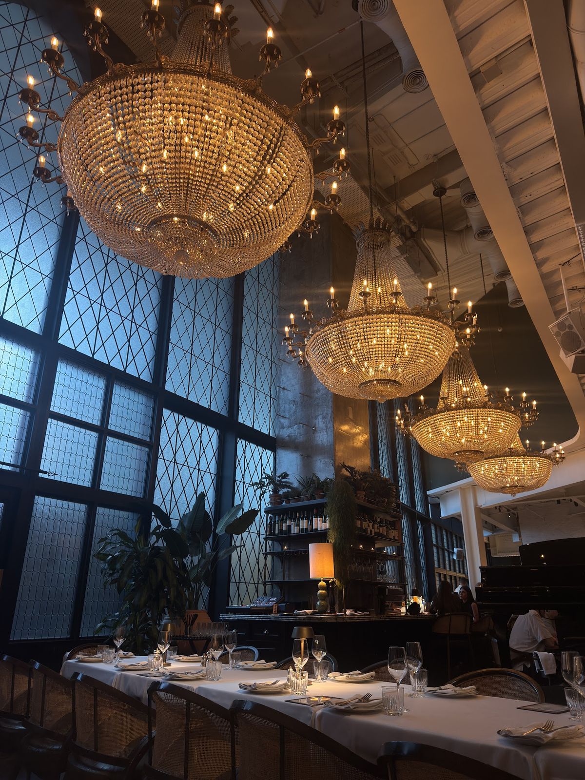 The Maine Land Brasserie Dubai — brasserie interior with leather booths