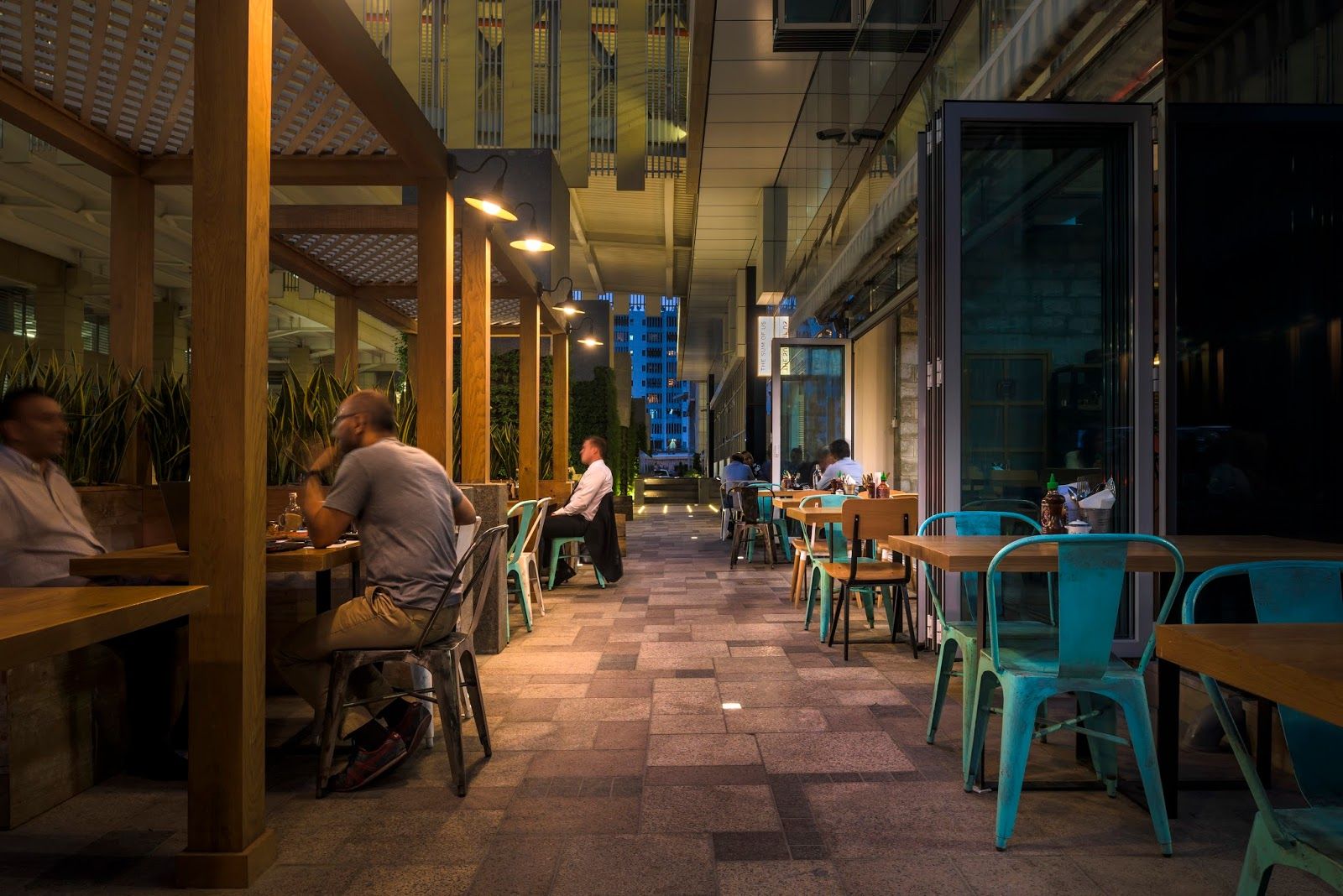 The Sum of Us DIFC &mdash; bright industrial breakfast cafe with concrete floors and roasting bar
