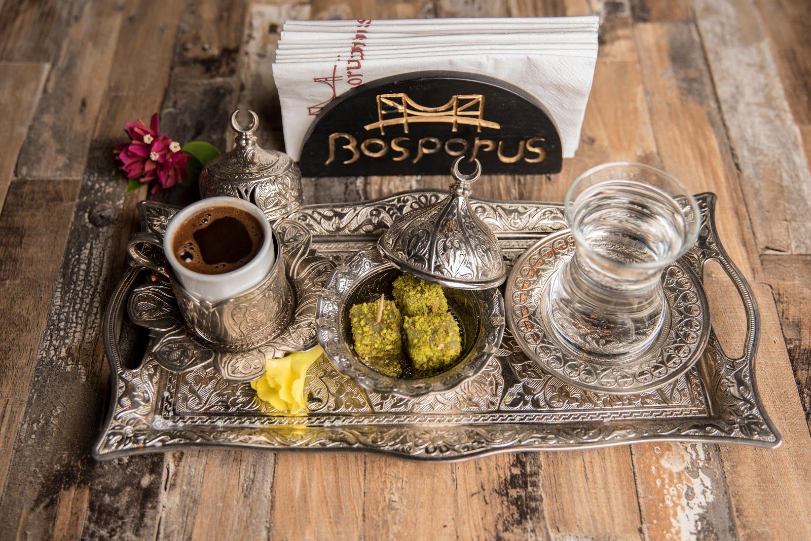 Turkish food spread at Souk Al Bahar — kebabs, mezze dips and fresh bread with Dubai Fountain views